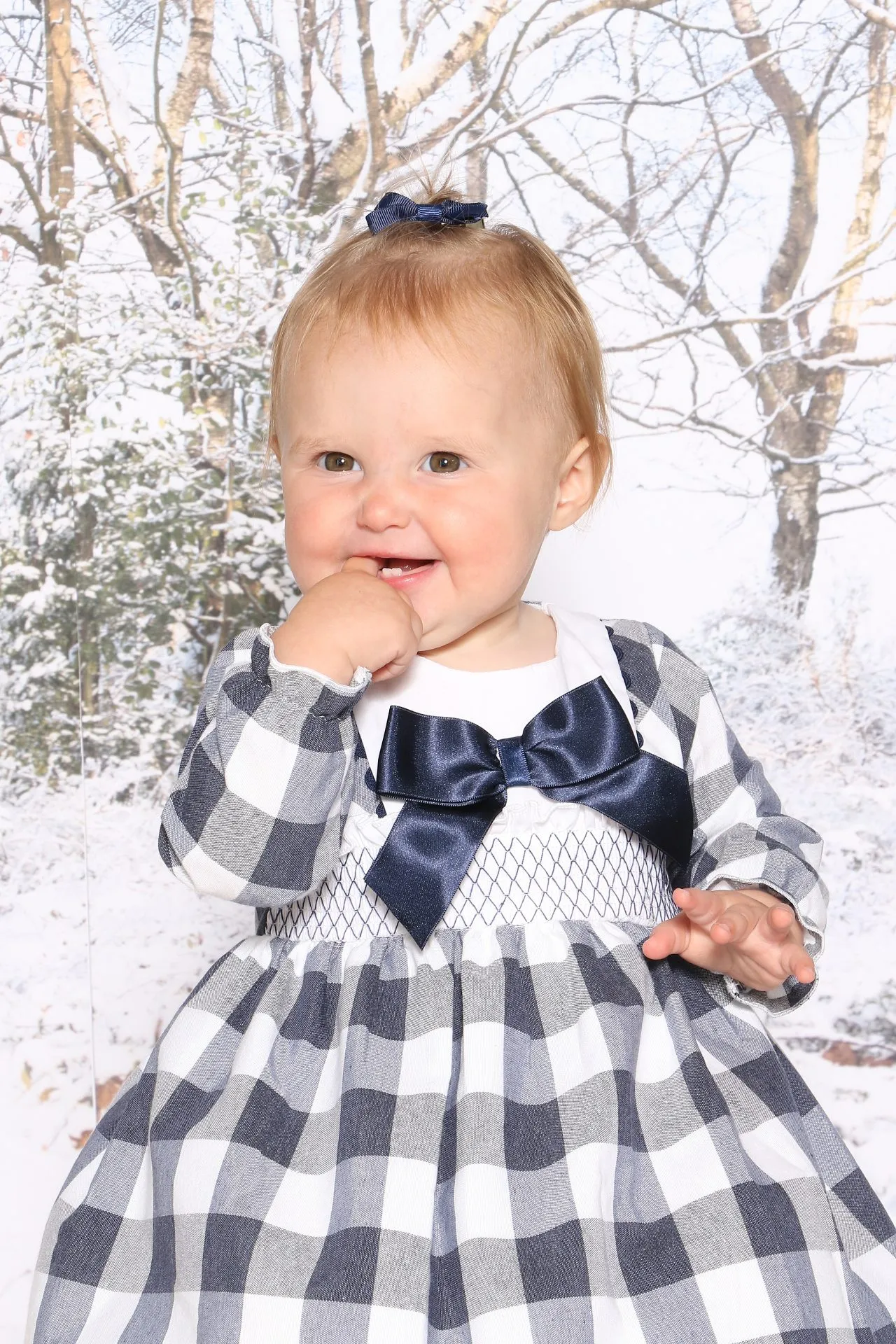 close up of child on snowy scene